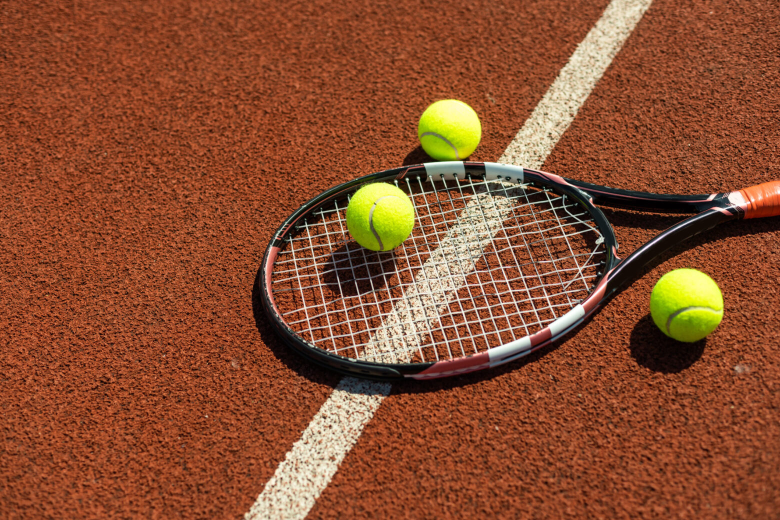 tennis racket with a tennis ball on a tennis court 2023 11 27 04 51 20 utc scaled e1727724984654